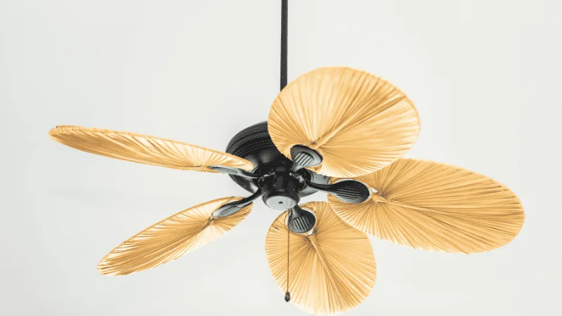A brown wooden ceiling fan perfect for old look