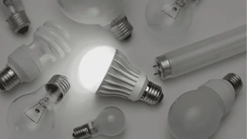 you can use LED bulbs in enclosed fixtures